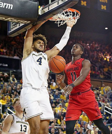 Isaiah Livers (4) and Ignas Brazdeikis (13)