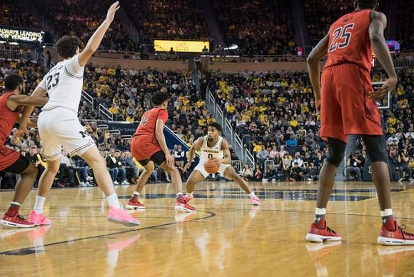 Brandon Johns Jr. (23) and David DeJulius (0)