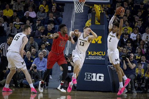Jon Teske (15), Ignas Brazdeikis (13), and Jordan Poole (2)