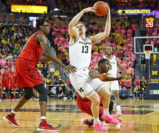 Ignas Brazdeikis (13) and Zavier Simpson (3)