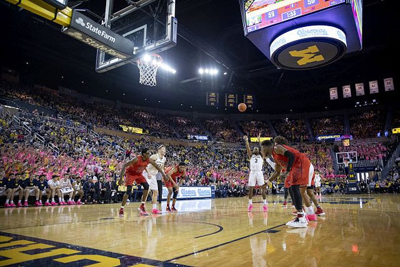 Ignas Brazdeikis (13) and Zavier Simpson (3)