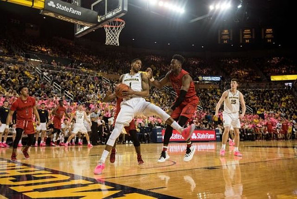 Charles Matthews (1), Ignas Brazdeikis (13), and Jon Teske (15)