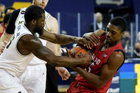 Chaundee Brown Jr. (15) and Austin Davis (51)