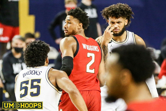 Eli Brooks (55) and Isaiah Livers (2)