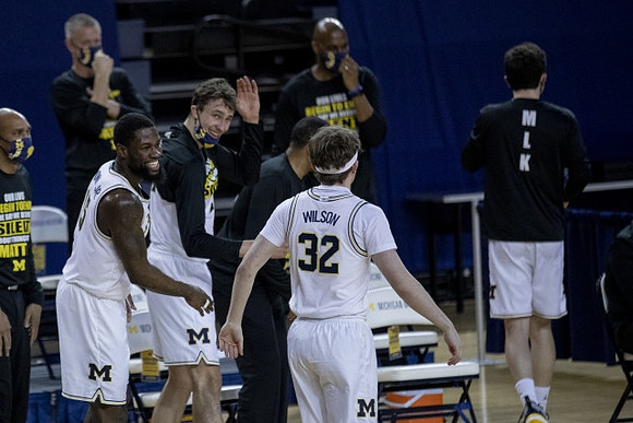 Chaundee Brown Jr. (15), Franz Wagner (21), and Luke Wilson (32)