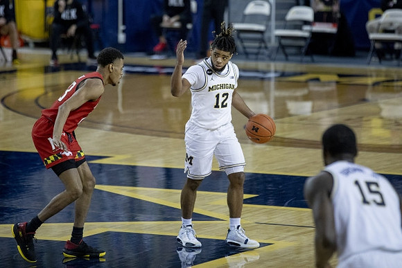 Mike Smith (12) and Chaundee Brown Jr. (15)