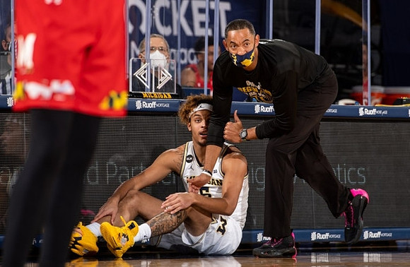Terrance Williams II (5) and Juwan Howard