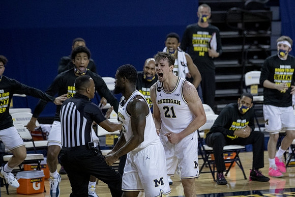 Chaundee Brown Jr. (15) and Franz Wagner (21)