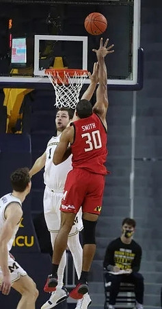 Hunter Dickinson (1) and Franz Wagner (21)