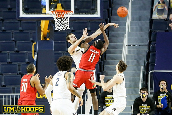 Isaiah Livers (2), Hunter Dickinson (1), and Franz Wagner (21)