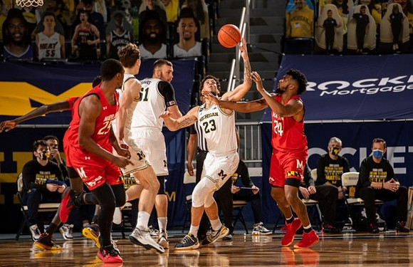 Franz Wagner (21), Austin Davis (51), and Brandon Johns Jr. (23)