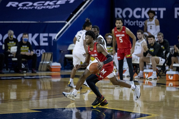Mike Smith (12) and Chaundee Brown Jr. (15)