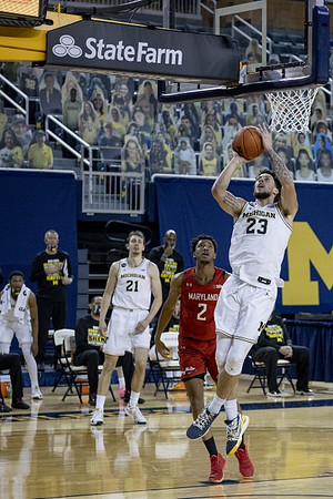 Franz Wagner (21) and Brandon Johns Jr. (23)