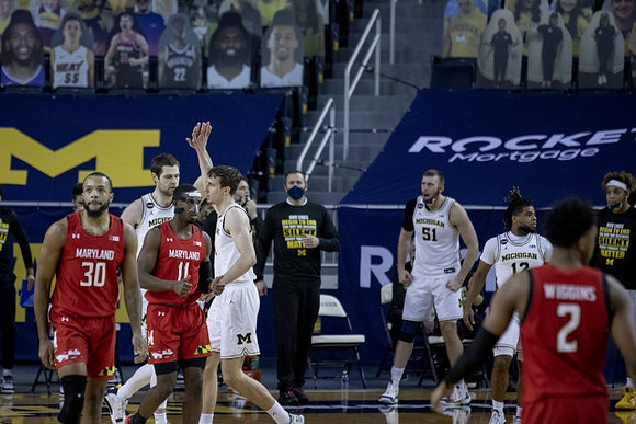 Hunter Dickinson (1), Franz Wagner (21), Austin Davis (51), Mike Smith (12), and Terrance Williams II (5)