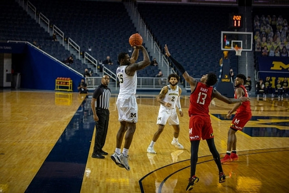 Chaundee Brown Jr. (15) and Isaiah Livers (2)