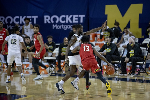Mike Smith (12) and Chaundee Brown Jr. (15)