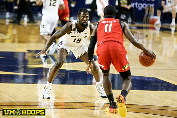 Mike Smith (12) and Chaundee Brown Jr. (15)