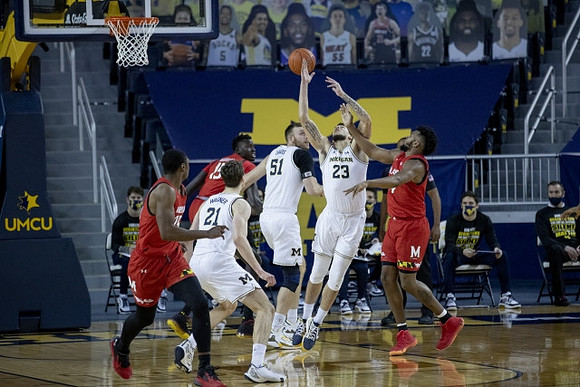 Franz Wagner (21), Austin Davis (51), and Brandon Johns Jr. (23)