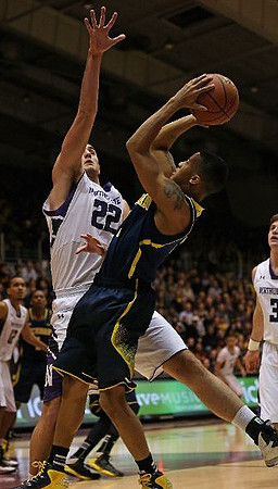 Trey Burke (3) and Glenn Robinson III (1)