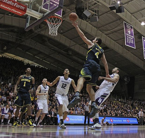 Glenn Robinson III (1) and Mitch McGary (4)