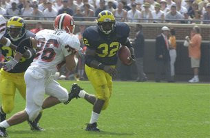 Anthony Thomas (32) and B.J. Askew (35)