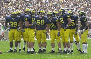 Evan Coleman (39), Eric Brackins (51), Grant Bowman (60), Dan Rumishek (92), John Spytek (42), DeWayne Patmon (15), and Brandon Williams (12)