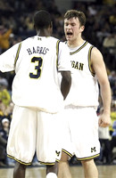 Zack Novak (0) and Manny Harris (3)