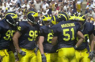 Alain Kashama (95), Dave Petruziello (96), and Eric Brackins (51)