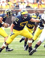 Adam Kraus, Chad Henne, and Michael Hart