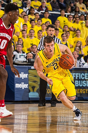 Aubrey Dawkins (24), Max Bielfeldt (44), Derrick Walton Jr. (10), Kameron Chatman (3), and Spike Albrecht (2)