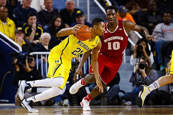 Ricky Doyle (32), Zak Irvin (21), Aubrey Dawkins (24), and Spike Albrecht (2)
