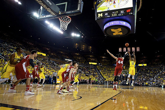 Derrick Walton Jr. (10) and Mark Donnal (34)