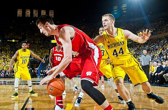 Derrick Walton Jr. (10), Kameron Chatman (3), and Max Bielfeldt (44)