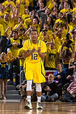 Ricky Doyle (32) and Derrick Walton Jr. (10)