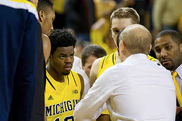 Derrick Walton Jr. (10) and Max Bielfeldt (44)