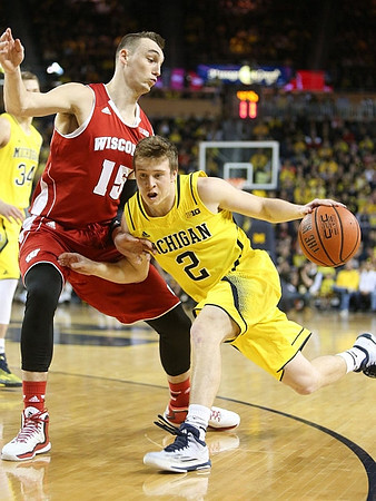 Spike Albrecht (2) and Mark Donnal (34)