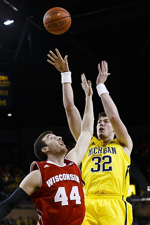 Derrick Walton Jr. (10) and Ricky Doyle (32)
