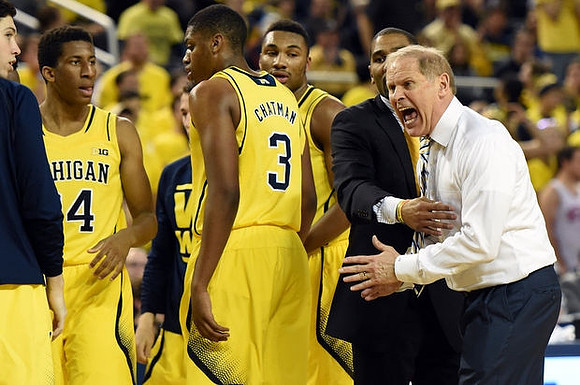 Sean Lonergan (20), Aubrey Dawkins (24), Kameron Chatman (3), Zak Irvin (21), LaVall Jordan, and John Beilein