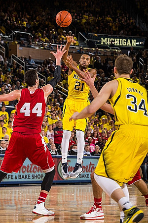 Derrick Walton Jr. (10), Aubrey Dawkins (24), Muhammad-Ali Abdur-Rahkman (12), and Zak Irvin (21)