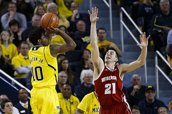 Kameron Chatman (3), Zak Irvin (21), Ricky Doyle (32), Derrick Walton Jr. (10), and  Muhammad-Ali Abdur-Rahkman (12)