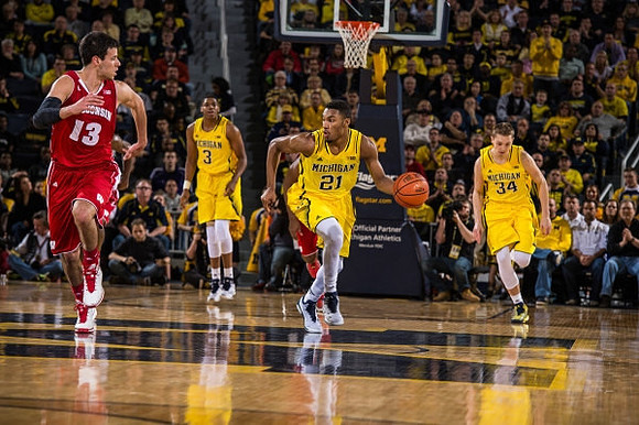 Muhammad-Ali Abdur-Rahkman (12), Ricky Doyle (32), and Derrick Walton Jr. (10)
