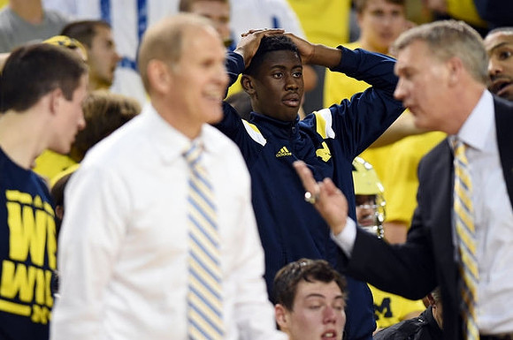 Caris LeVert (23), Ricky Doyle (32), Jeff Meyer, and John Beilein
