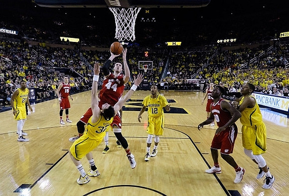 Spike Albrecht (2) and Derrick Walton Jr. (10)