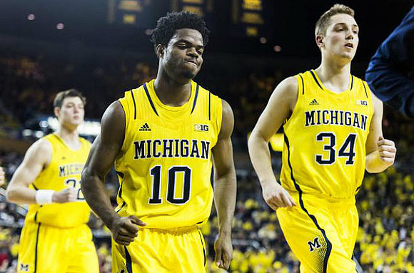 Ricky Doyle (32), Derrick Walton Jr. (10), and Mark Donnal (34)