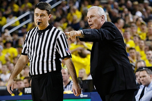 Zak Irvin (21), Spike Albrecht (2), Ricky Doyle (32), Muhammad-Ali Abdur-Rahkman (12), and Derrick Walton Jr. (10)