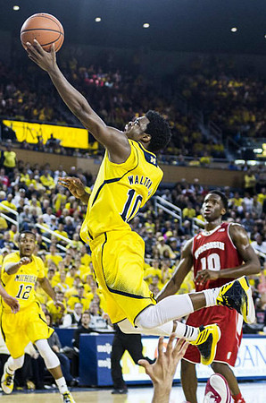 Muhammad-Ali Abdur-Rahkman (12) and Derrick Walton Jr. (10)