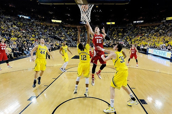 Zak Irvin (21), Ricky Doyle (32), Spike Albrecht (2), and Aubrey Dawkins (24)