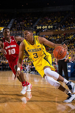 Derrick Walton Jr. (10) and Ricky Doyle (32)
