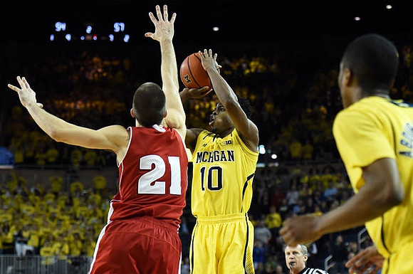 Derrick Walton Jr. (10) and Muhammad-Ali Abdur-Rahkman (12)