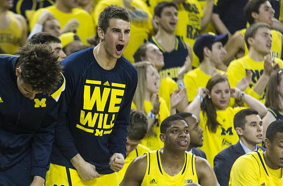 D.J. Wilson (5), Austin Hatch (30), and Kameron Chatman (3)